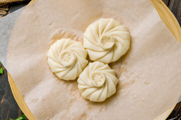 Khinkali with cheese on plate top view