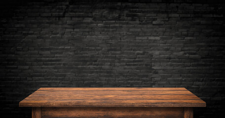 empty wood table on brick wall background
