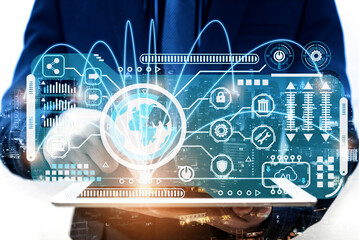 double exposure of businessman using tablet computer sending and download digital data info with blur city night. Mobile connect networking with cloud communication concept.	