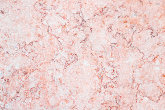 Pink marble pattern. Close-up photo texture. Natural stone plate