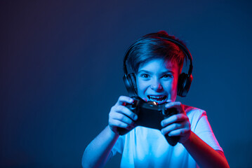 Enthusiastic gamepad game. Joystick games in neon light. © stenkovlad
