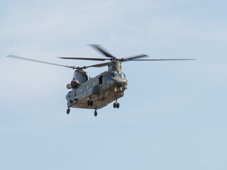Fototapeta na wymiar Military helicopter in flight