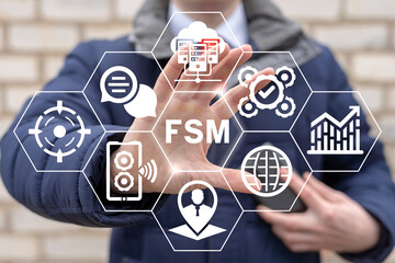 FSM Field Service Management Software Concept. Businessman using virtual touchscreen represents FSM conceptual banner.