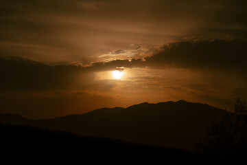 Sunset Over a Mountain