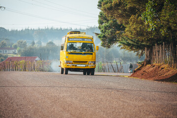 Yellow school bus in Africa. Education in Kenya, illustration photo. Edit space.