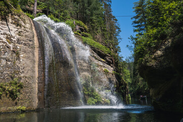 Fototapeta na wymiar Waterfall at Edmundova Souteska (Edmund's Gorge) near Hrensko in Bohemian Switzerland, Czech Republic