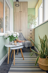 Peony flowers bouquet in interior of cozy balcony