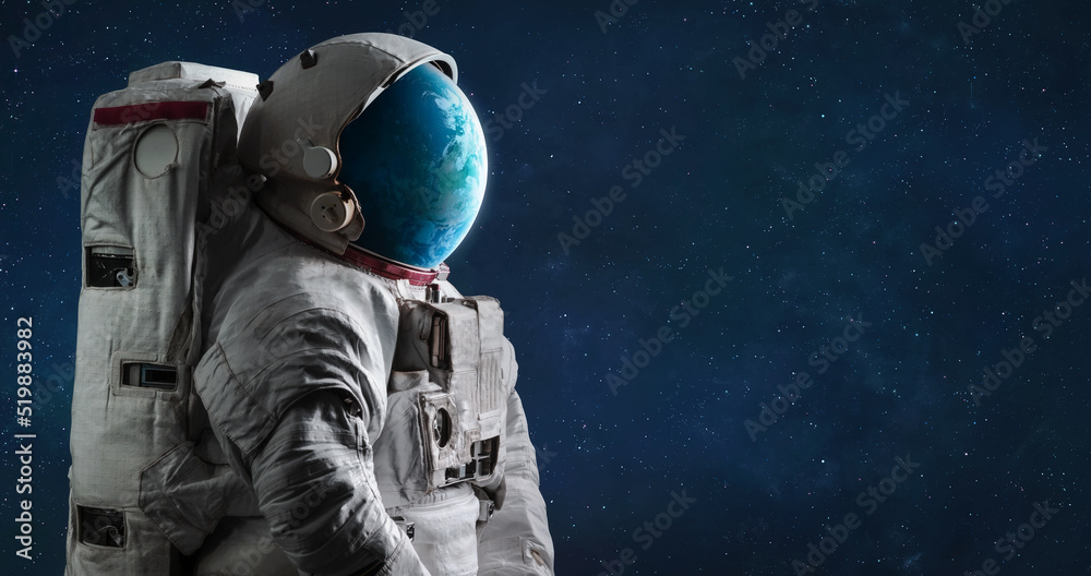 Wall mural spaceman with planet earth globe in helmet. astronaut in space. surreal space art. elements of this 