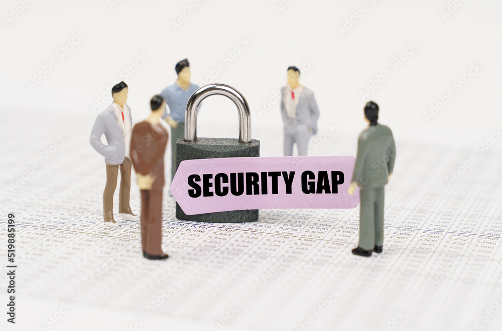 Poster There are figures of people on business reports, a padlock with a sticker on which it is written - Security gap