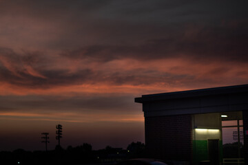 sunset on the top of a parking garage