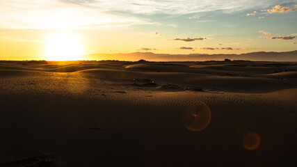 Puesta de sol sobre las dunas del Delta de l'Ebro