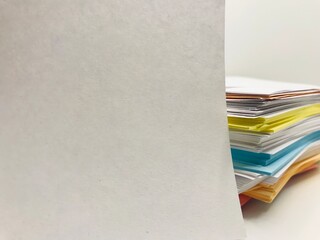 Colourful blank paper sheet on a white background. Design, template or mockup. Sticky paper with copy space for your message.