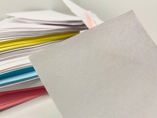 Colourful blank paper sheets on a white background. Design, template or mockup. Sticky paper with copy space for your message.