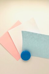 Colourful blank paper sheets on a white background. Design, template or mockup. Sticky paper with copy space for your message.