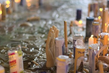 People pray and light candles inside the our lady national cathedral in Aparecida city, São Paulo State, in Southeast Brazil 