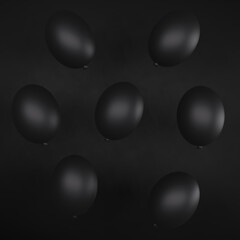 Czarne balony na czarnym tle