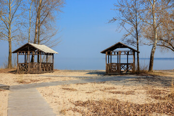 Wooden canopies by the river