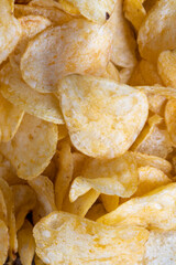 scattered potato chips with natural spices