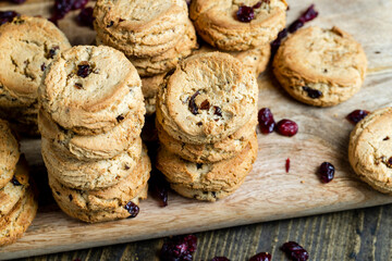 delicious dried cookies made of high-quality flour with dried red cranberries on the table