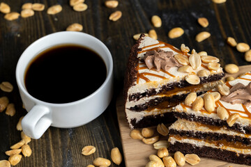 caramel cake with peanuts and buttercream, close up