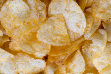 scattered potato chips with natural spices