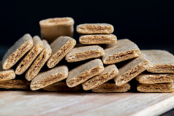 waffle sweets stuffed with grated fruit on the table