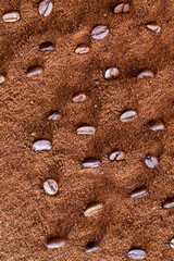 roasted coffee beans on the table , close up