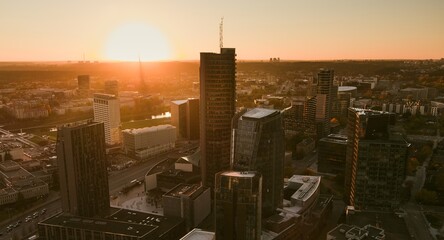 Beautiful aerial evening view of Vilnius business district with scenic sunset illumination.