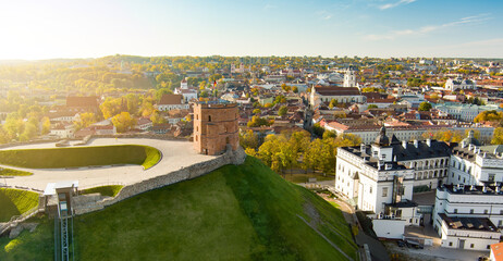Obraz premium Beautiful Vilnius city panorama in autumn with orange and yellow foliage. Fall city scenery in Vilnius, Lithuania