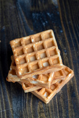 square sweet soft waffles on the table