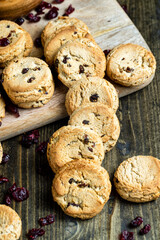 delicious dried cookies made of high-quality flour with dried red cranberries on the table