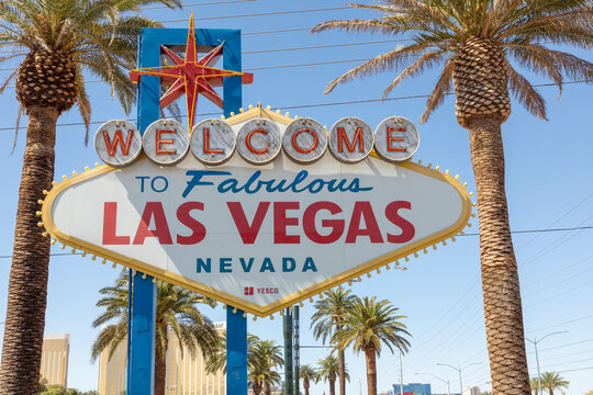 people enjoy the famous Welcome To Las Vegas sign at the entrance to Las Vegas, Nevada