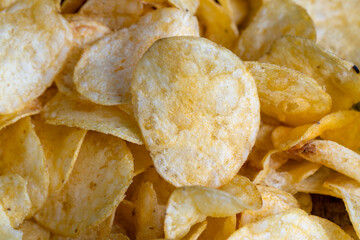 scattered potato chips with natural spices