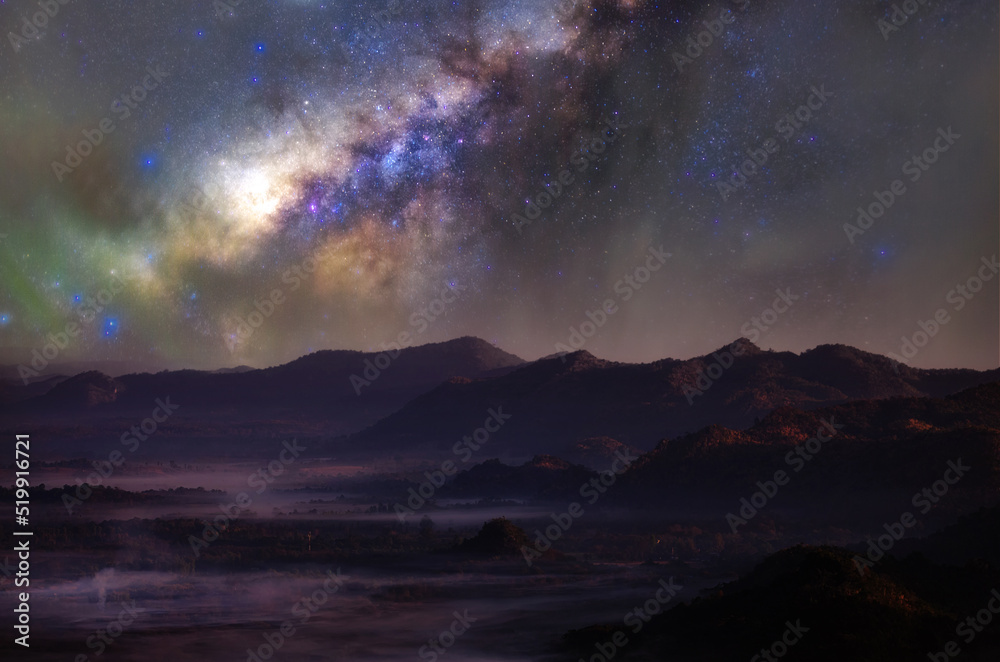 Wall mural milky way galaxy with stars and space dust in the universe, long speed exposure, night landscape wit