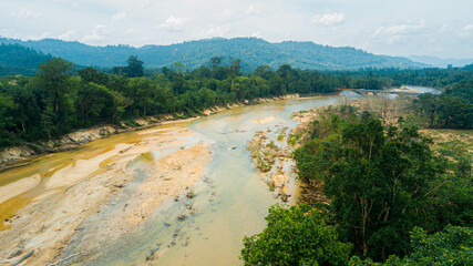 Fototapeta na wymiar Aerial drone view of river scenery in Hutan Lipur Belukar Bukit, Kuala Berang, Terengganu, Malaysia.