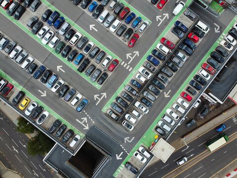 Aerial View High Angle Footage Of Modern Car Park In The Building And Roof Top At City Centre Of Luton Town Of England UK