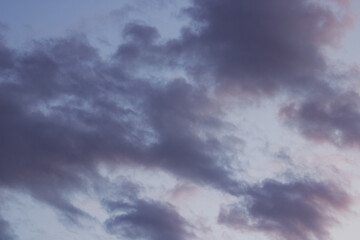 Naklejka na ściany i meble Purple clouds in the sky