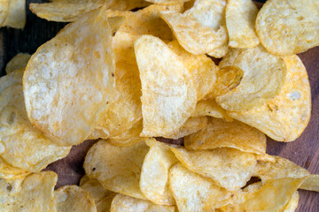 scattered potato chips with natural spices
