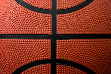 Zoom close up photograph on the bumpy details of a genuine rubber basketball concept for...