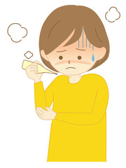 発熱し体温計を見る女性