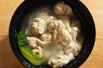 takeout food bowls of wontons