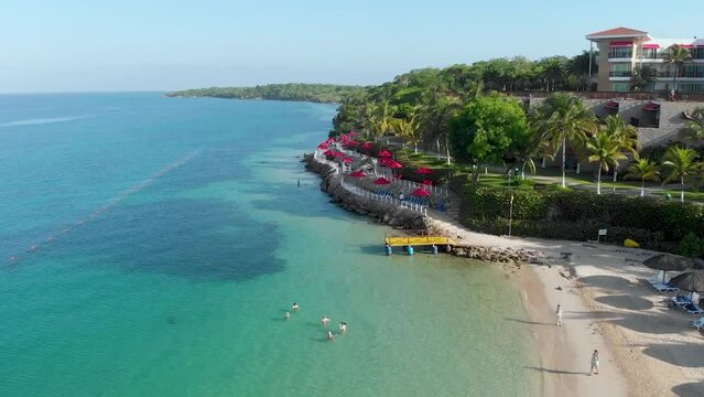Aerial view of a paradise beach with turquoise water in Baru, Cartagena, Colombia
