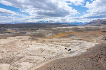 Beautiful landscape mountains Altai Republic Russia, texture of white sand in Moon valley, aerial top view with sunlight