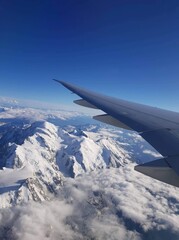 Fototapeta na wymiar view from airplane window of mountains