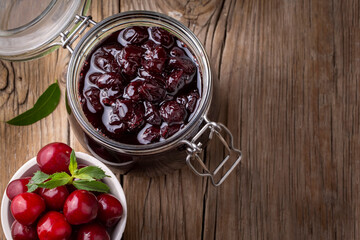 Jars with freshly homemade cherry jam, sour cherry jam, Turkish name; Visne receli