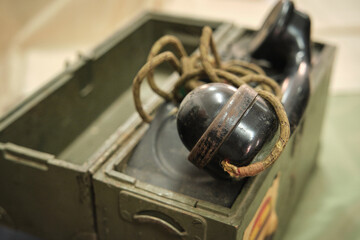 an old military phone in his briefcase