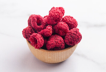 Bowl of Freeze Dried Raspberries on a Marble Kitchen Counter
