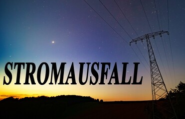 Power outage text (Stromausfall on german)  on starry sky background. The energy crisis in Europe...