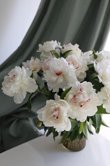  bouquet of white flowers peonies in the vase on table