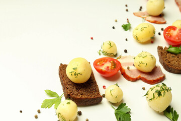 Concept of tasty food with boiled young potatoes, space for text
